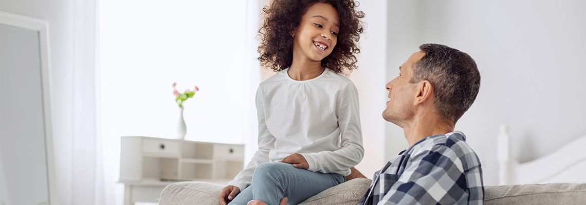 Happy little girl with her guardian